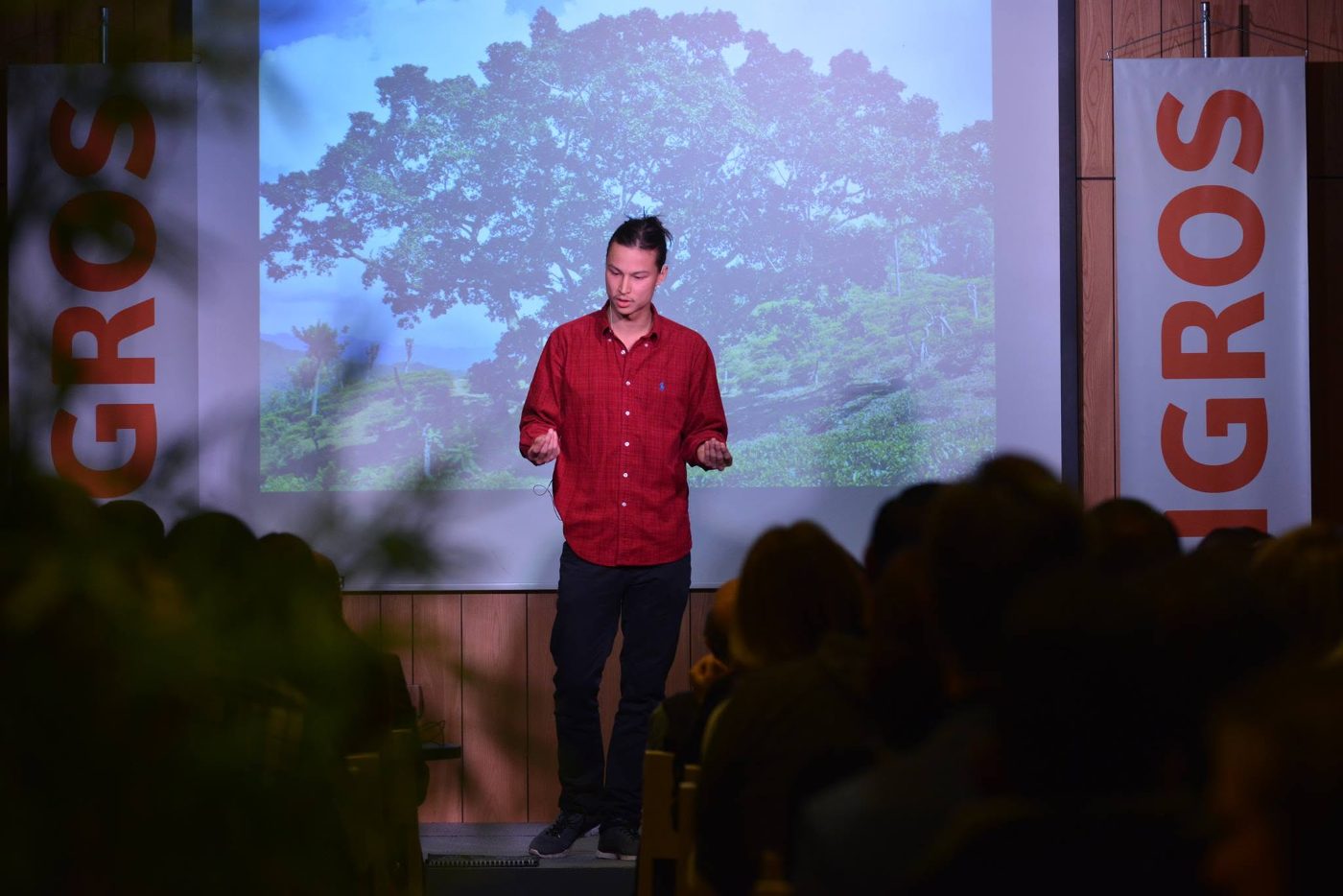 On stage in Geneva, telling stories from years on the road